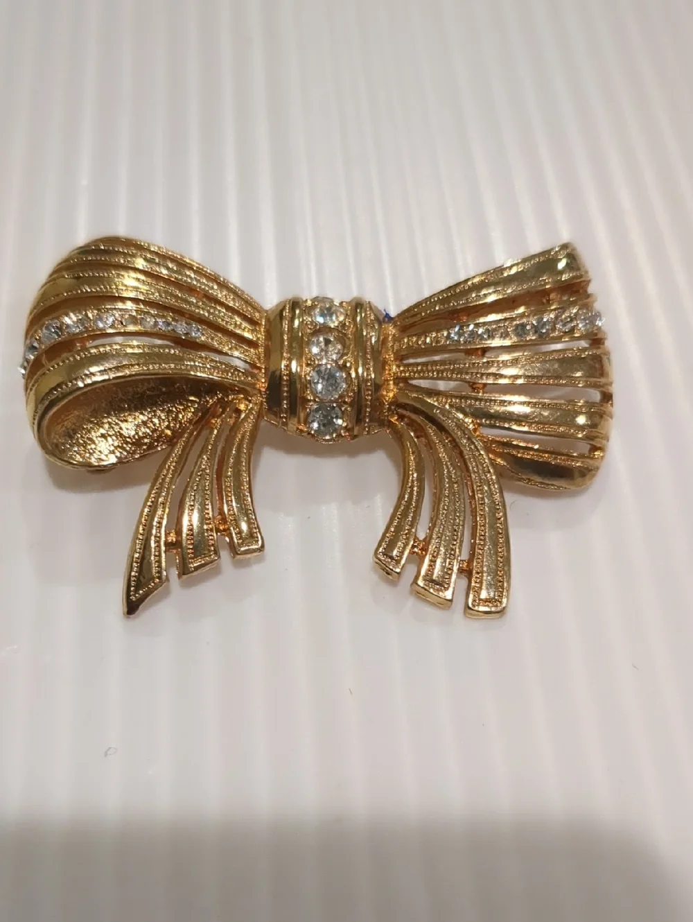 Vintage Czech gold-tone Bow Pin Brooch Clear Glass Rhinestones